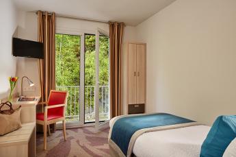 Hotel Roissy Lourdes chambre confort simple proche de la grotte